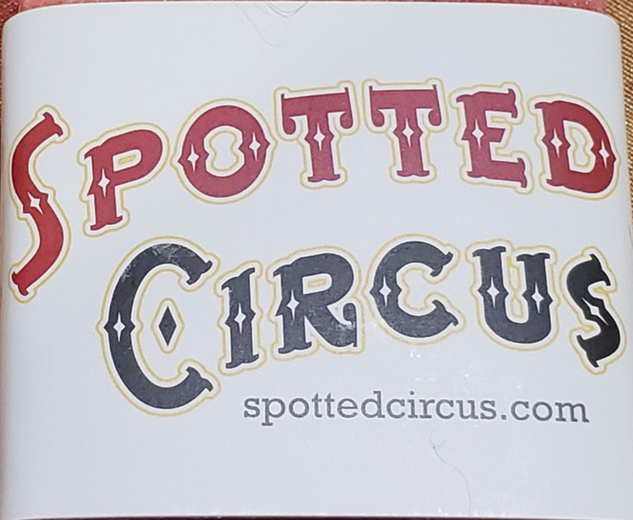 Spotted circus logo